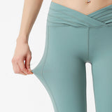 Front waist cross exposed navel nude feeling comfortable and fit-fitting sports yoga pants women's high-elastic nylon fitness pants